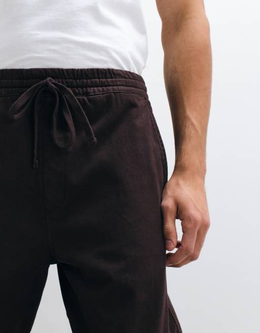 Carhartt WIP floyd wide leg trackies in brown, 2 of 5