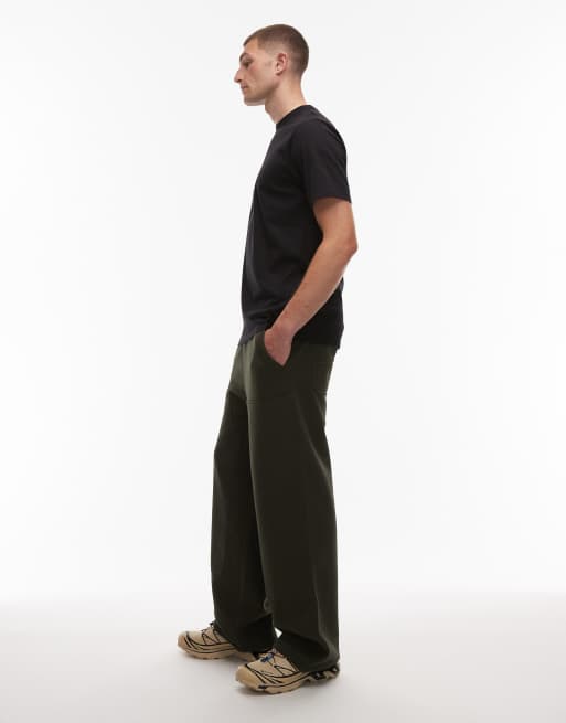 Carhartt WIP – Gröna, baggy byxor med dubbla knäpaneler, 3 av 5