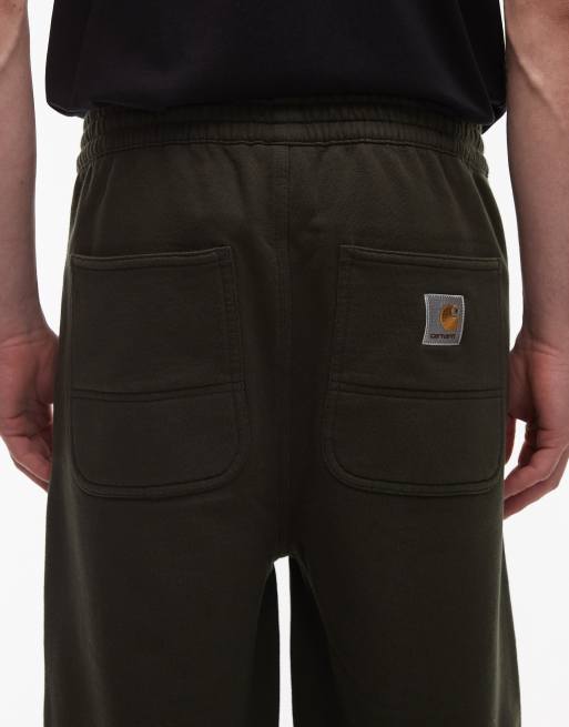 Carhartt WIP – Gröna, baggy byxor med dubbla knäpaneler, 4 av 5