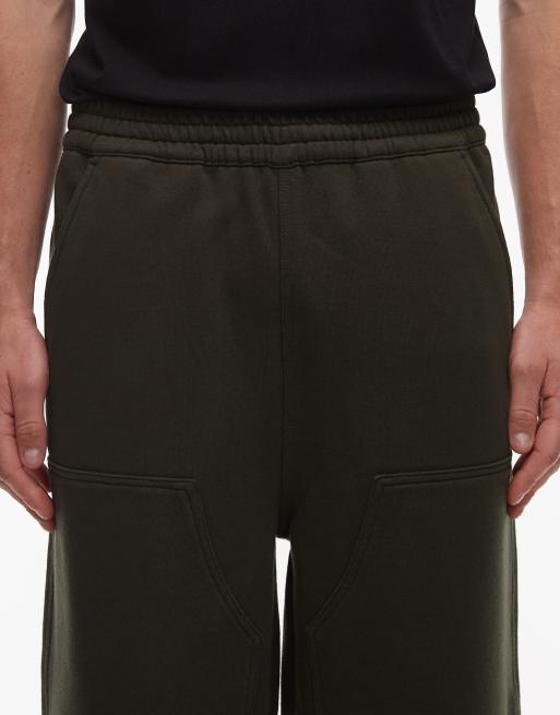 Carhartt WIP – Gröna, baggy byxor med dubbla knäpaneler, 5 av 5