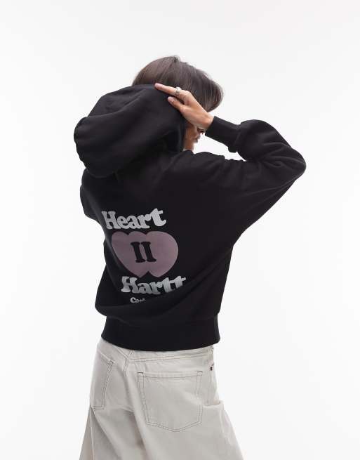 Carhartt WIP - Heart II Hartt - Sort hættetrøje med lynlås og motiv på ryggen