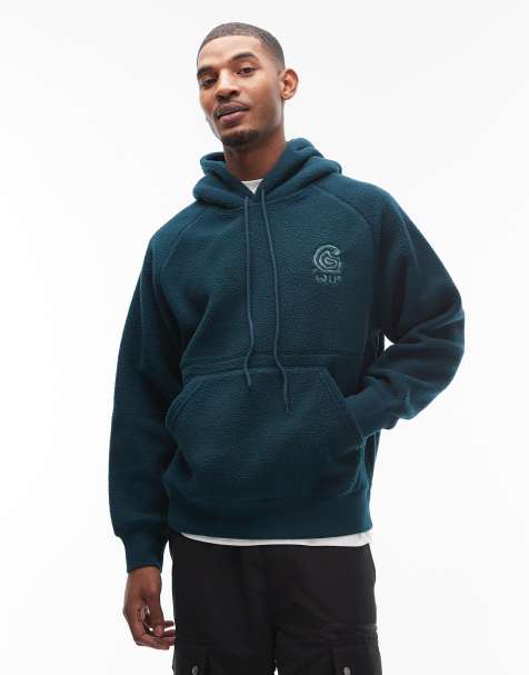Carhartt WIP helix fleece oversized pullover hoodie in dark green - view 1