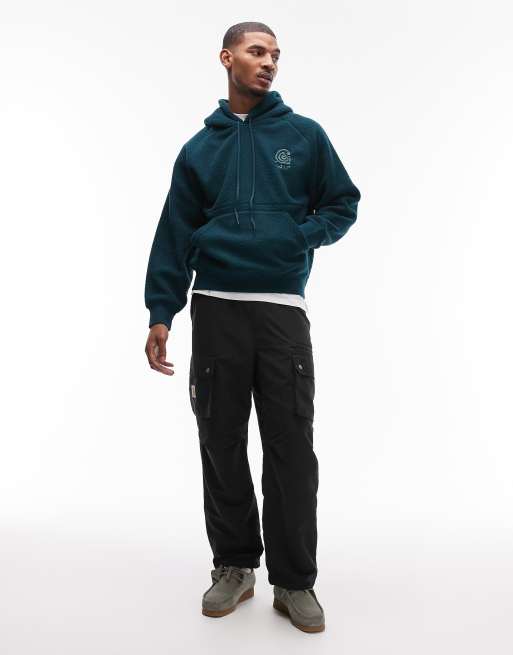 Carhartt WIP helix fleece oversized pullover hoodie in dark green, 2 of 5