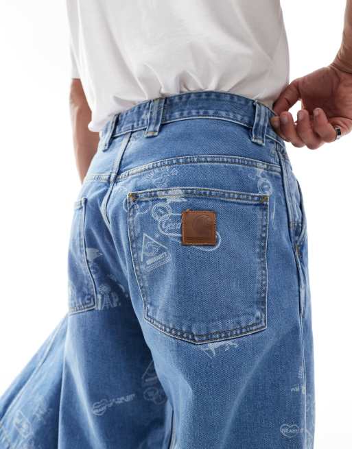 Carhartt WIP - Jeans affusolati ampi blu con stampa stile timbro, 3 di 5