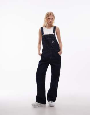 Carhartt WIP - Jeans-Latzhose in verwaschenem Blau