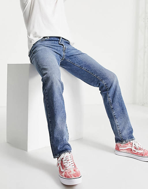 Men Carhartt WIP klondike regular taper jeans in mid blue wash 