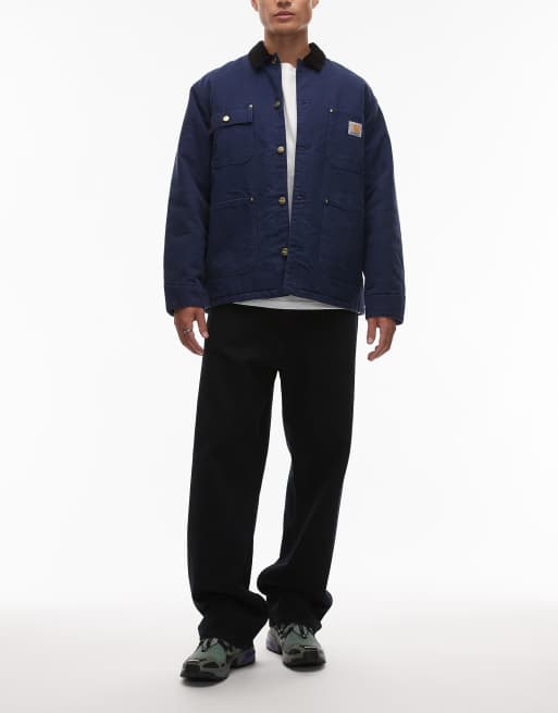 Carhartt WIP – Landon – Granatowe luźne jeansy ze zwężanymi nogawkami z efektem przebarwienia