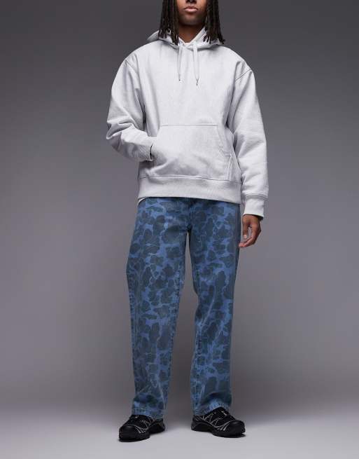 Carhartt WIP - Landon - Losvallende jeans met toelopende pasvorm in blauw met camouflageprint