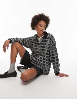 Carhartt WIP - Largo - Langärmliges Polo-Oberteil in Schwarz mit Streifen