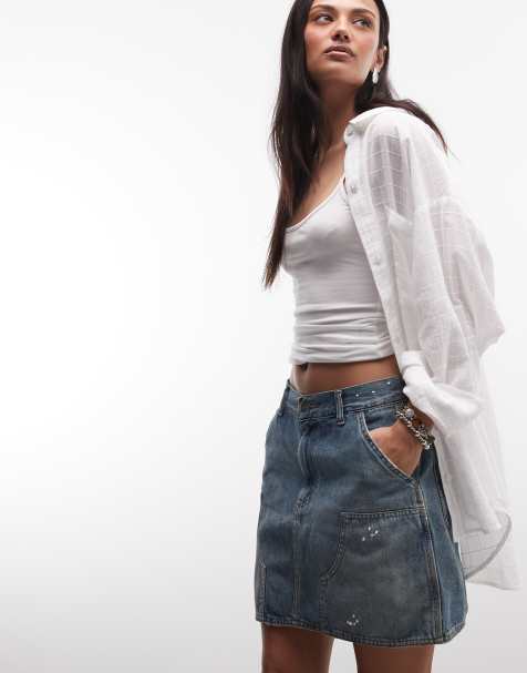 Carhartt WIP – Maeve – Smutsblå, tvättad minikjol i denim med förstärkta knän och färgstänkseffekt - view 1