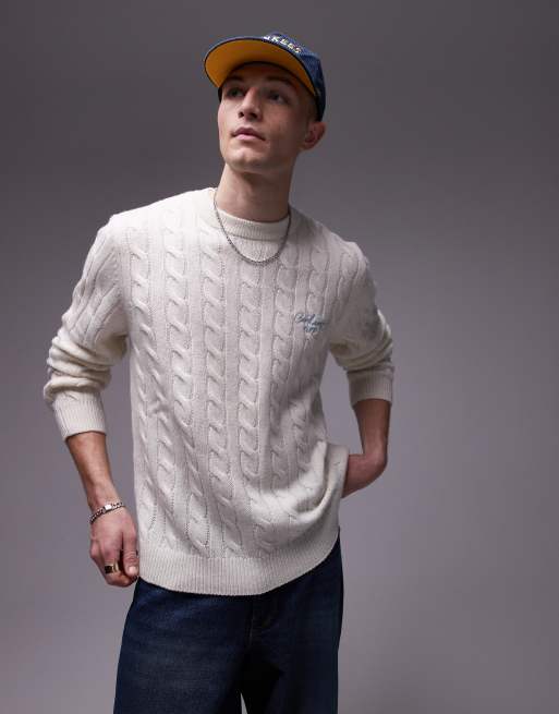 Carhartt WIP - Maglione lavorato a trecce color crema con logo