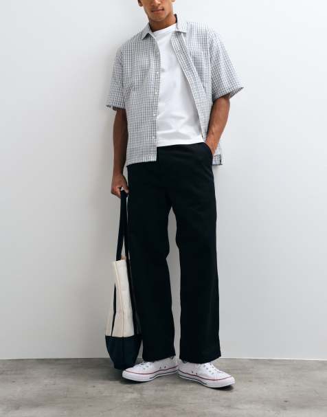 Carhartt WIP Module relaxed tapered fit pants in black - view 1