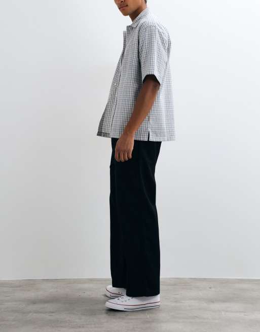Carhartt WIP Module spodnie o luźnym, zwężanym kroju w czerni, 4 z 5