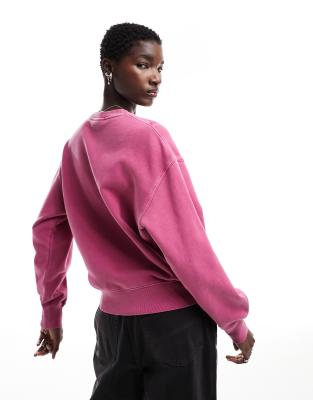 Carhartt WIP Nelson dyed sweatshirt in pink | ASOS