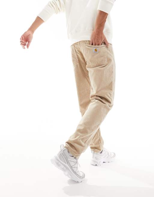 Carhartt WIP – Newel – Beżowe zwężane spodnie sztruksowe o luźnym kroju