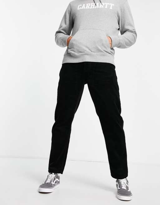 Carhartt WIP – Newel – Czarne sztruksowe spodnie o luźnym kroju ze zwężanymi nogawkami