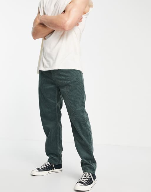 Carhartt WIP – Newel – Hose aus Cord in Grün 