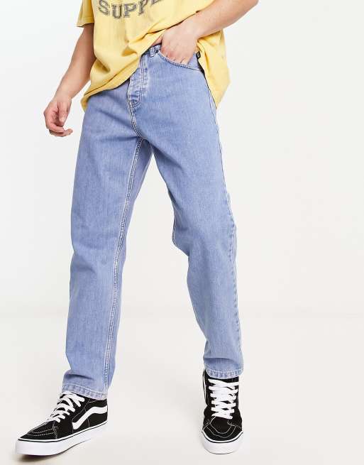 Carhartt WIP – Newel – Niebieskie zwężane jeansy o luźnym kroju z efektem wybielenia