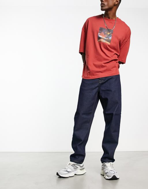 Carhartt WIP - Newel - Ruimvallende jeans met toelopende pijpen in blauw met wassing