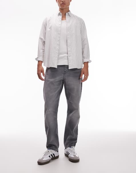 Carhartt WIP – Newel – Svarta, tvättade, avsmalnande jeans med avslappnad passform - view 1