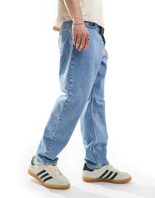 Carhartt WIP – Newel – Zwężane jeansy o luźnym kroju z efektem wybielenia