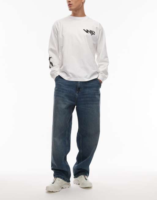 Carhartt WIP - OG - Blå forvaskede denimjeans i vintagestil med løstsiddende pasform og enkelt knæ