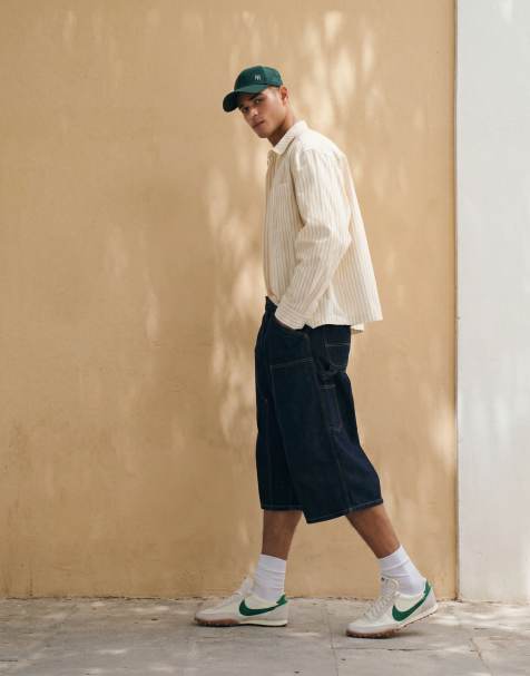 Carhartt WIP – OG – Lange Shorts in blauer Waschung mit doppelter Stofflage im Kniebereich - view 1