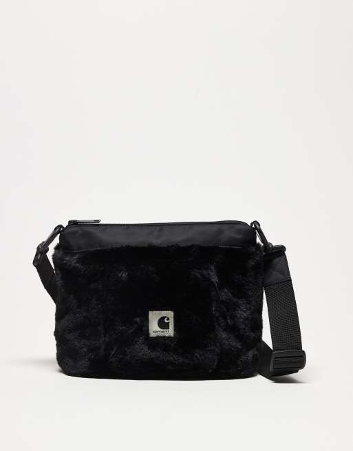 Carhartt WIP – Olney – Tasche mit Kunstpelz auf den Seiten in Schwarz