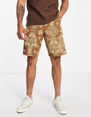 Carhartt WIP - Pantaloncini al ginocchio color cuoio con motivo cachemire