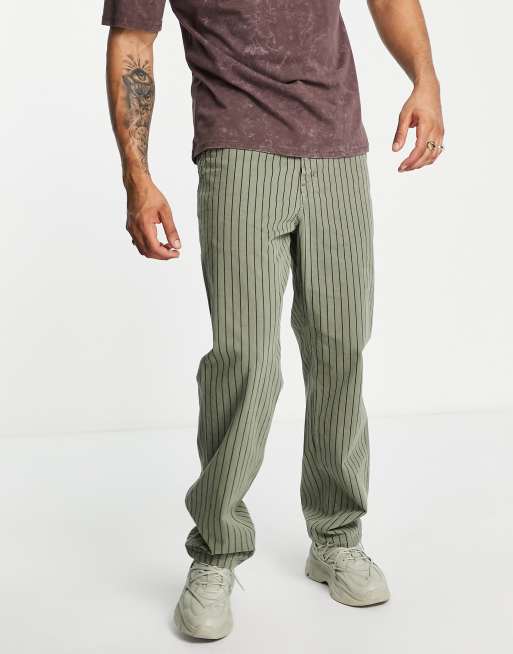 Carhartt WIP - Pantaloni verdi gessati stile worker
