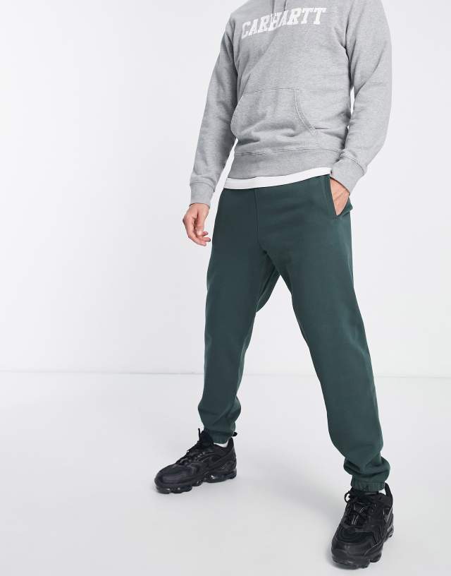 Carhartt WIP pocket sweatpants in green