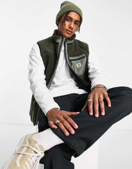 Carhartt WIP – Prentis – Kakifärgad väst i teddyfleece