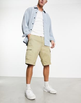 Carhartt WIP regular garment dyed cargo shorts in beige - view 1