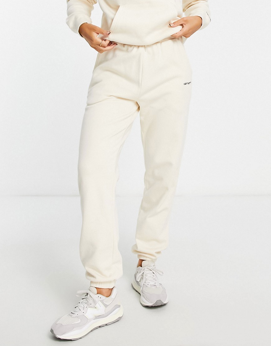 Carhartt WIP relaxed joggers with small logo in cream co-ord-White