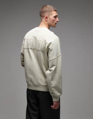 Carhartt WIP Carhartt WIP RGGD oversized sweatshirt in beige-Neutral