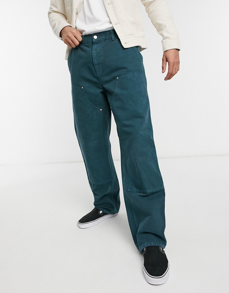 Carhartt WIP - Ruimvallende werkbroek met rechte pasvorm en dubbele kniestukken in gewassen blauwgroen