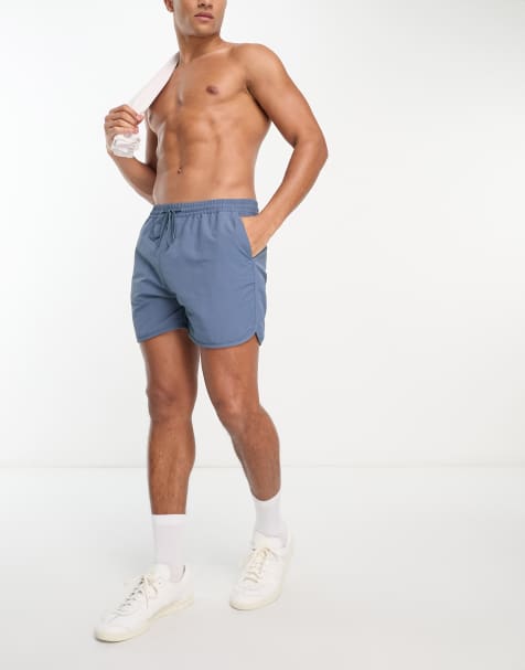 Carhartt WIP – Rune – Badeshorts in Blau - view 1