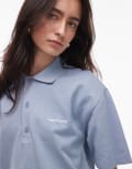 [Carhartt WIP] Carhartt WIP script polo in light blue L Light Blue