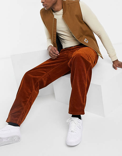 Carhartt WIP single knee corduroy trousers in burnt orange | ASOS