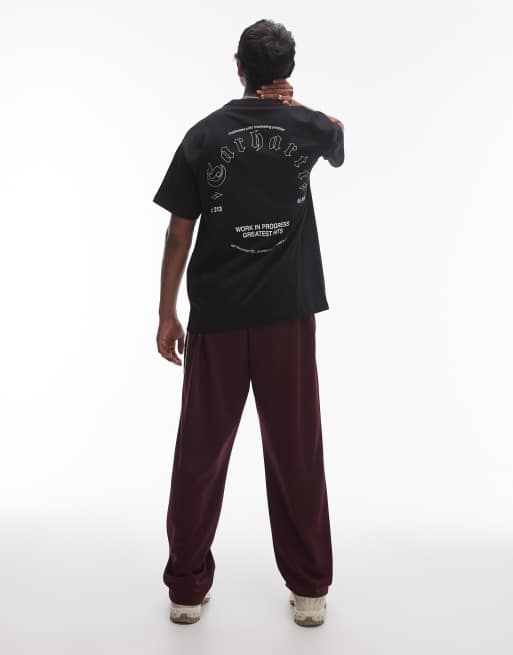 Carhartt WIP - Sort og kortærmet T-shirt med 'greatest hits'-print