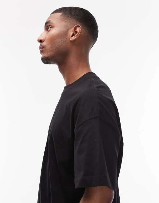 Carhartt WIP – Svart t-shirt i oversize med boxig passform och texttryck, 4 av 5