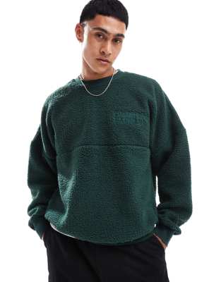Sweat en imitation peau de mouton  motif coordonnes - Carhartt Wip - Modalova
