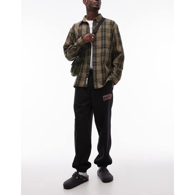 Carhartt WIP sweat pants in black ASOS