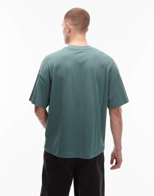 Carhartt WIP - T-shirt squadrata oversize verde slavato con logo, 3 di 5