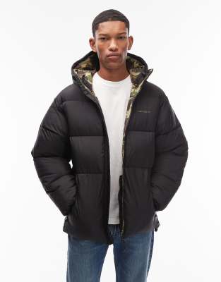 Carhartt WIP toronto water resistant puffer jacket in black with camo lining | ASOS