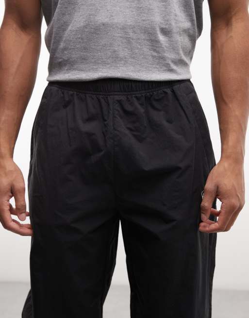 Carhartt WIP Travon relaxed fit pant in black, 4 of 5
