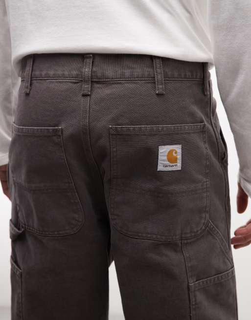 Carhartt WIP - Vaqueros de corte recto holgado de una rodilla en marrón lavado, 4 de 5