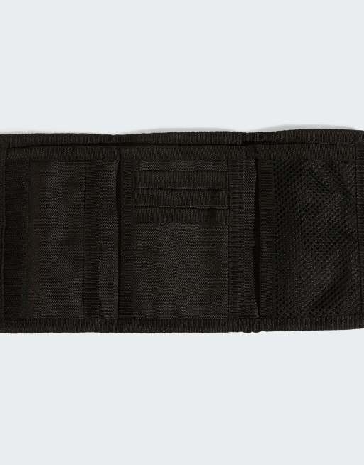 Cartera gris oscuro, gris claro y negra con detalle estampado Linear de adidas Performance, 2 de 3