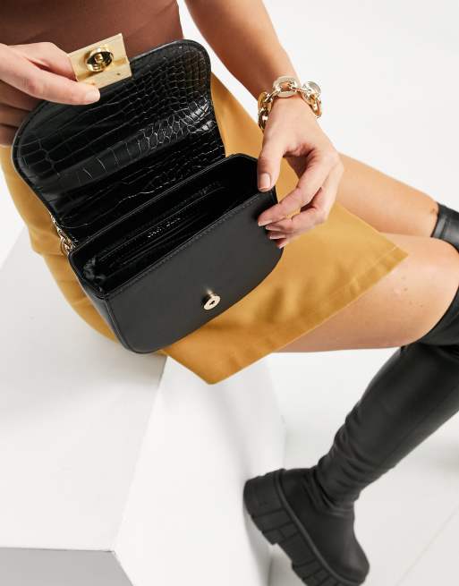 Carvela jill cross body bag with gold hardware in black croc