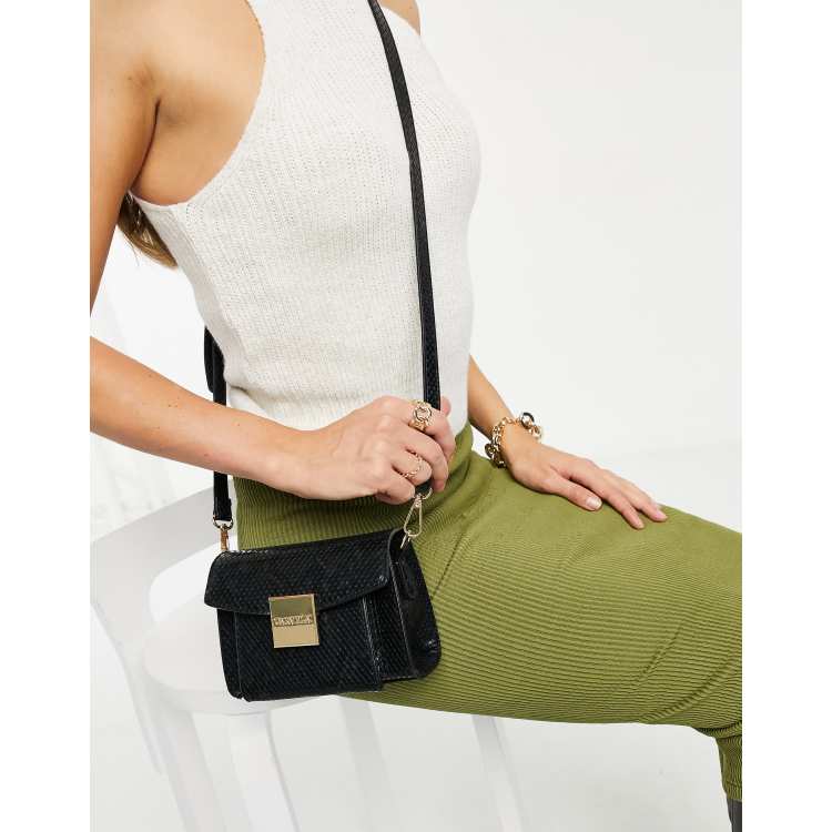 Carvela mini hoop cross body bag in black snake